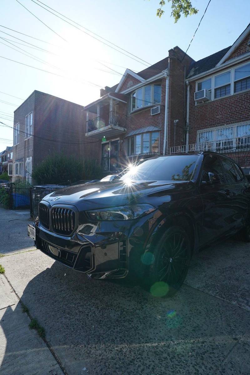 BMW X5 detailed with sun flare NYC — Xentra Auto