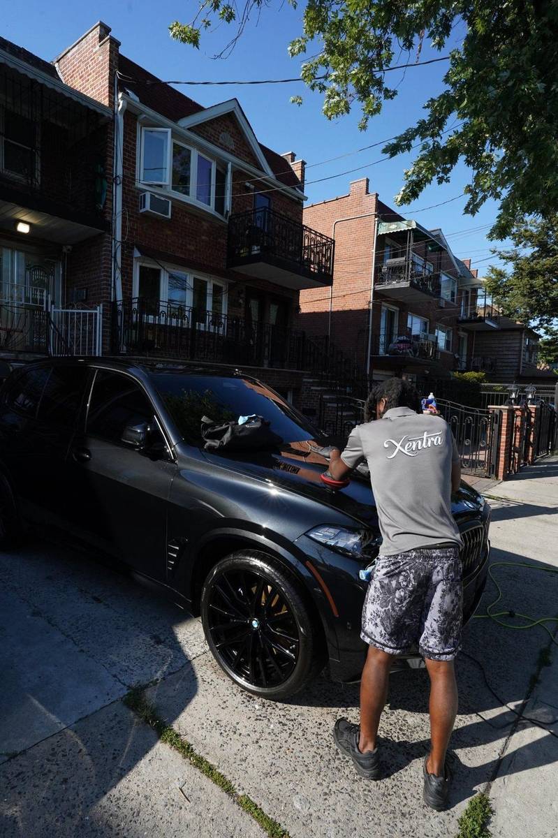 Xentra Auto technician polishing paint correction NYC